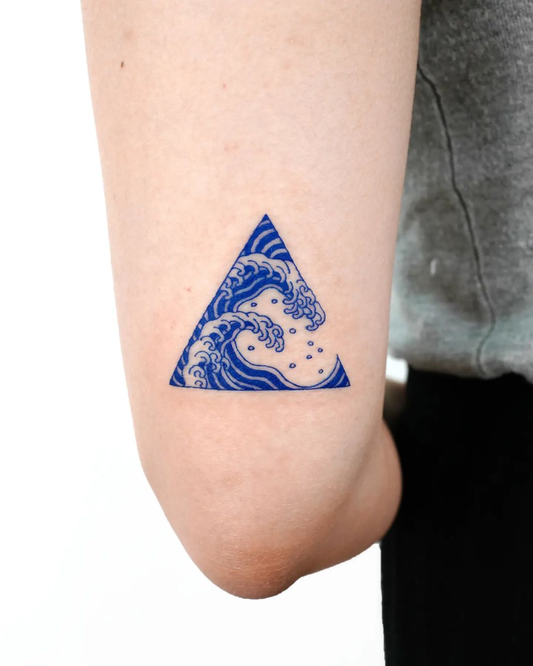 Tiny triangle tattoo design by nobodytattoo