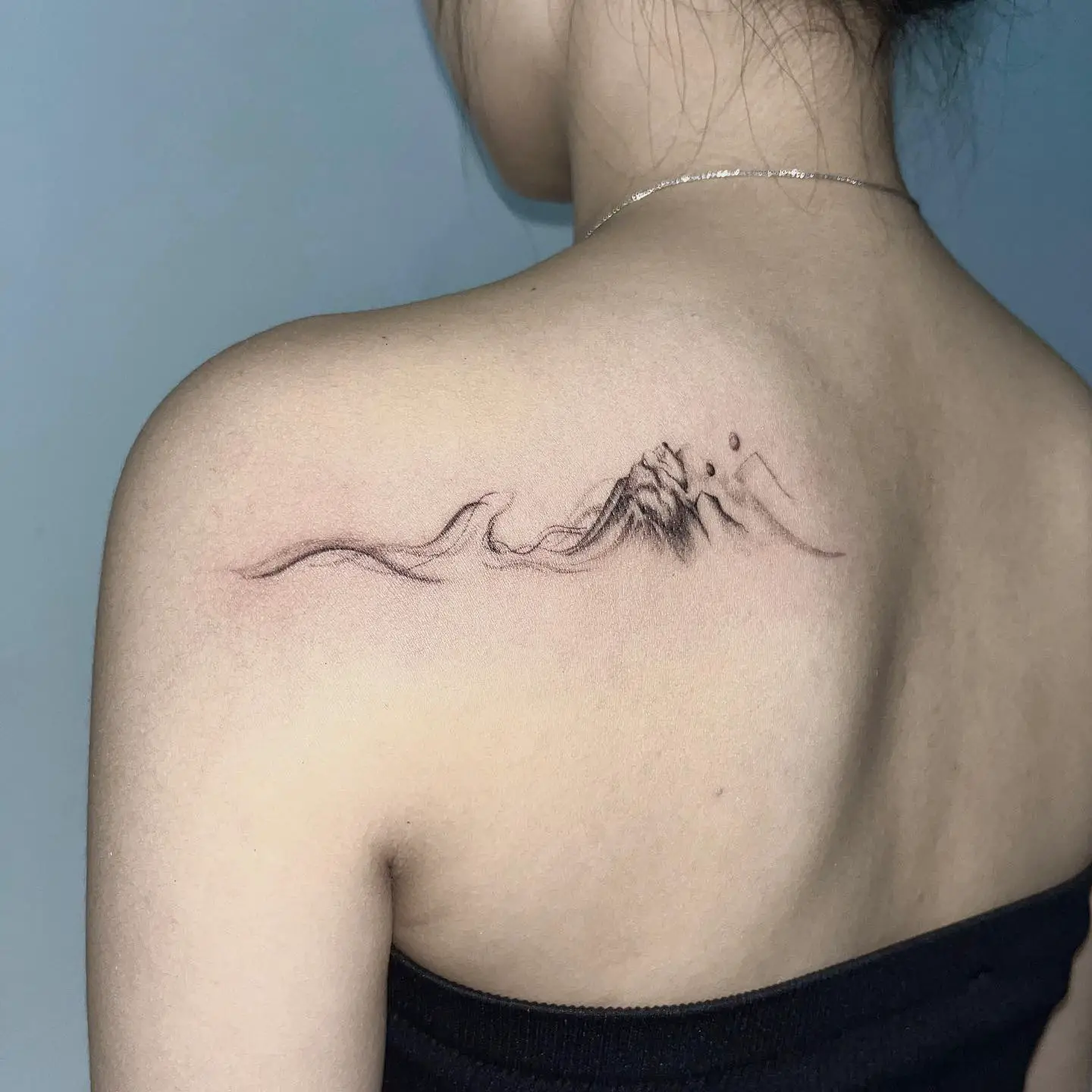 abstract mountain tattoo by