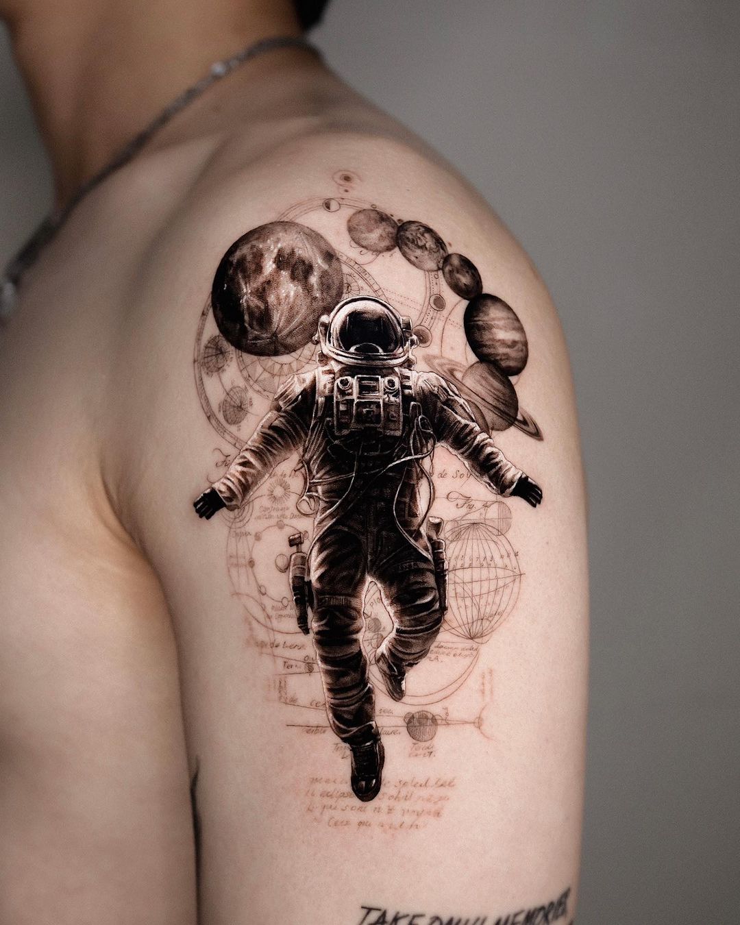 astranaut space tattoo by moco tattoo
