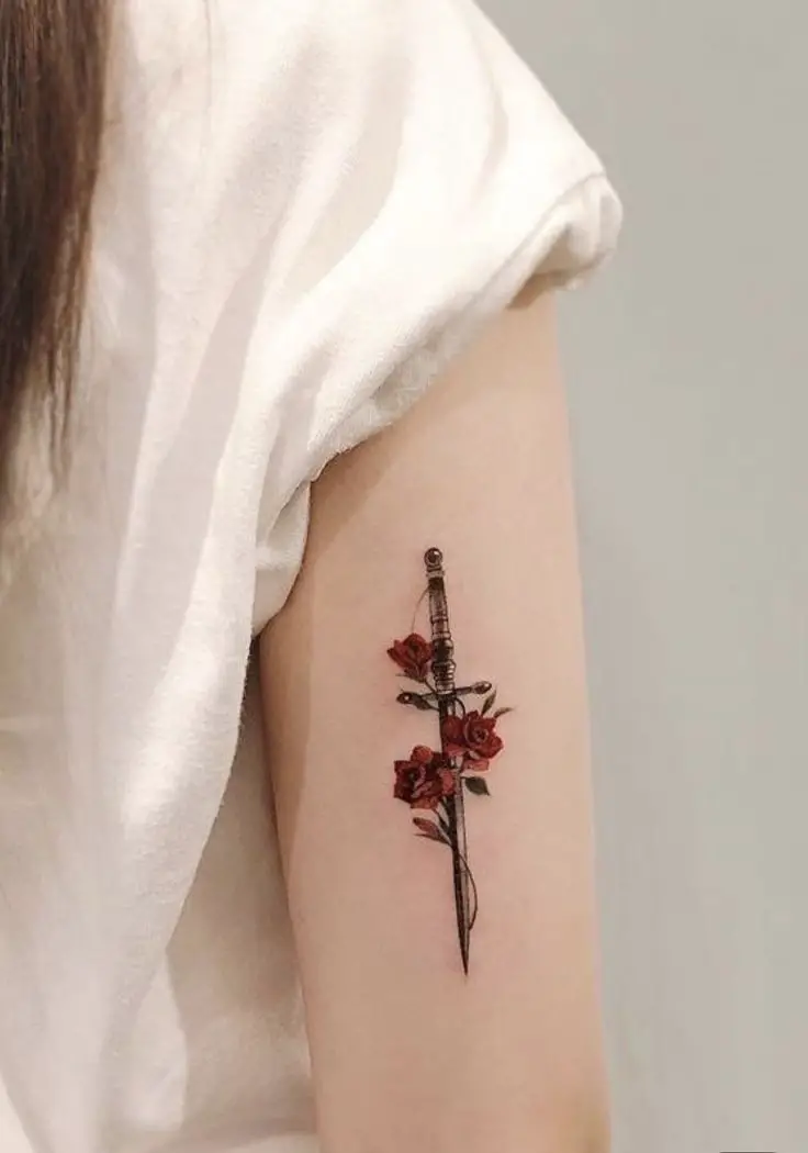 beautiful rose and sword tattoo