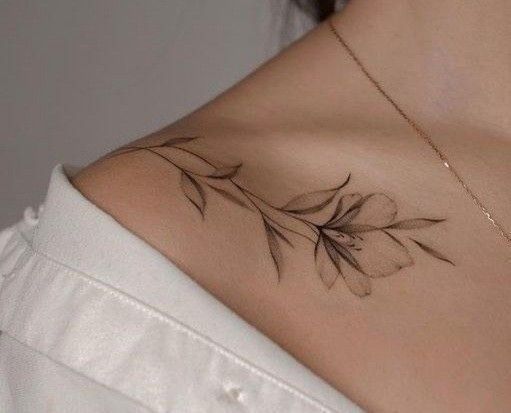 black inked lily on shoulder
