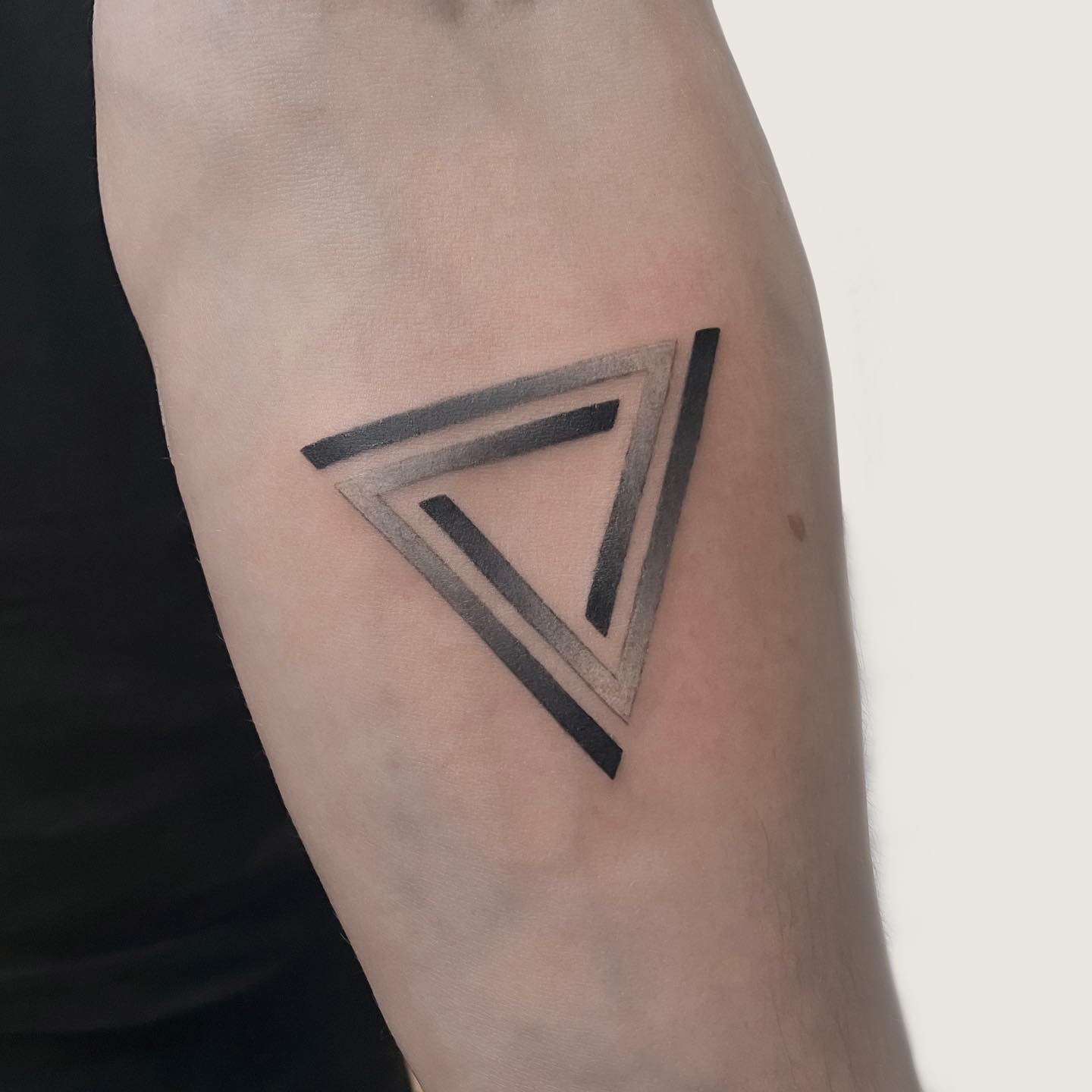 black triangle tattoo design by gizem.ink