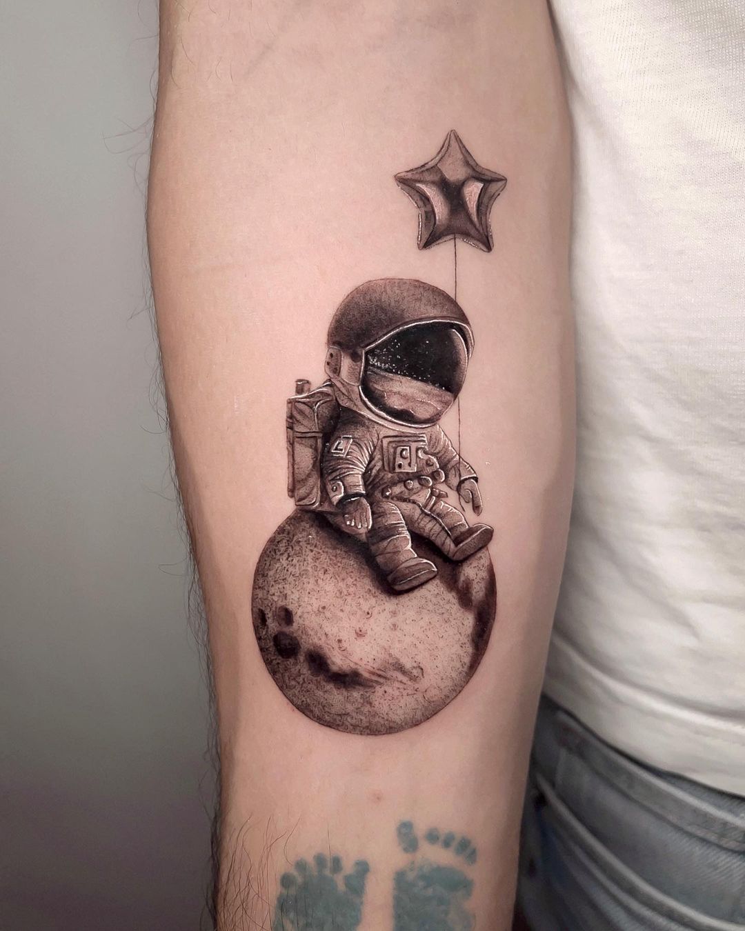 cute astronaut tattoo design by ivanruotolo.ink