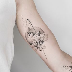 geometric daisy tattoo