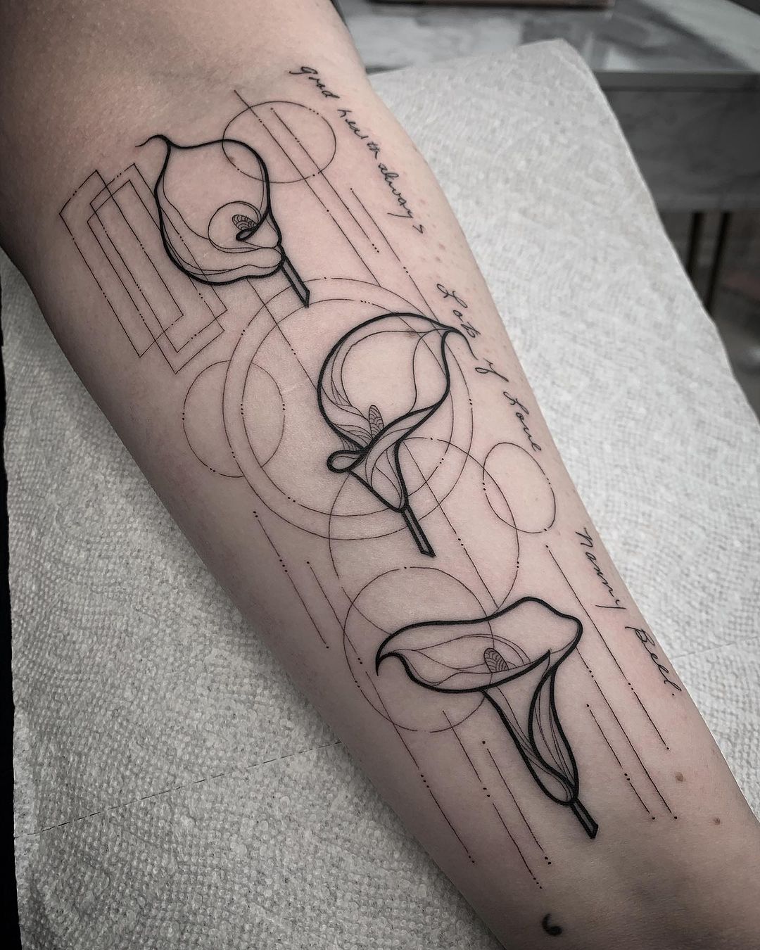 geometric tattoo on forearm by isismuniztattoo