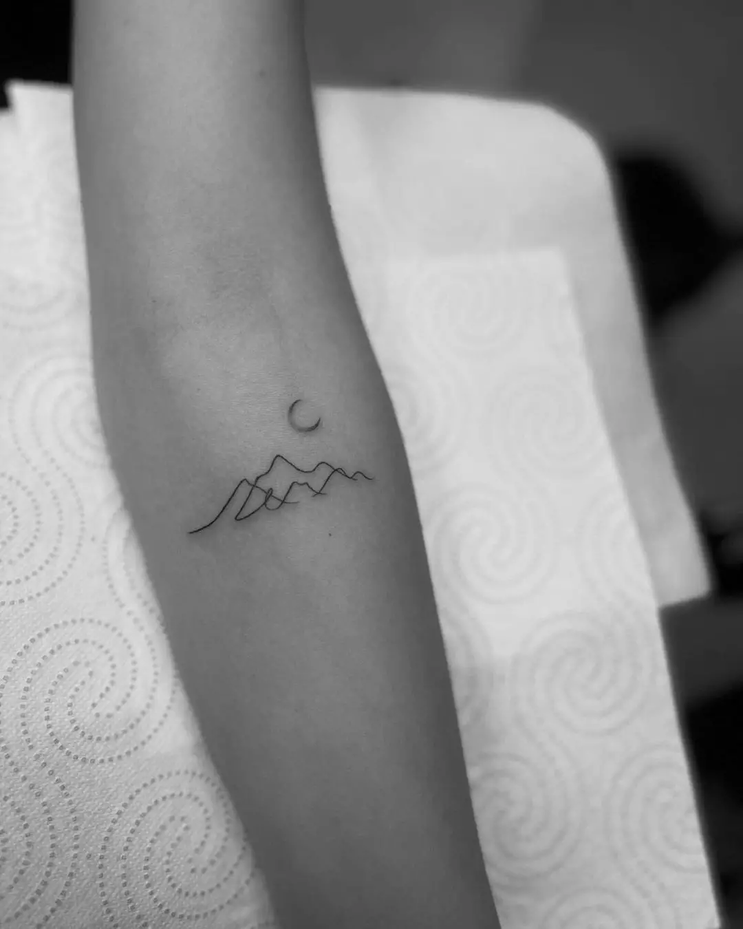 mini mountain tattoo by mala.czarna.tattooing