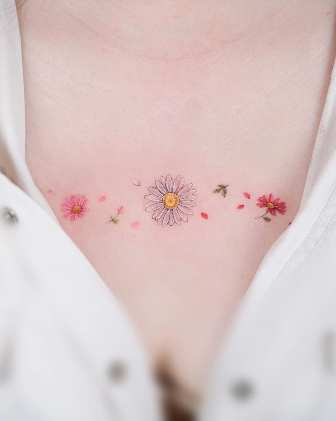 minimalistic daisy tattoo design by ciel tattoo
