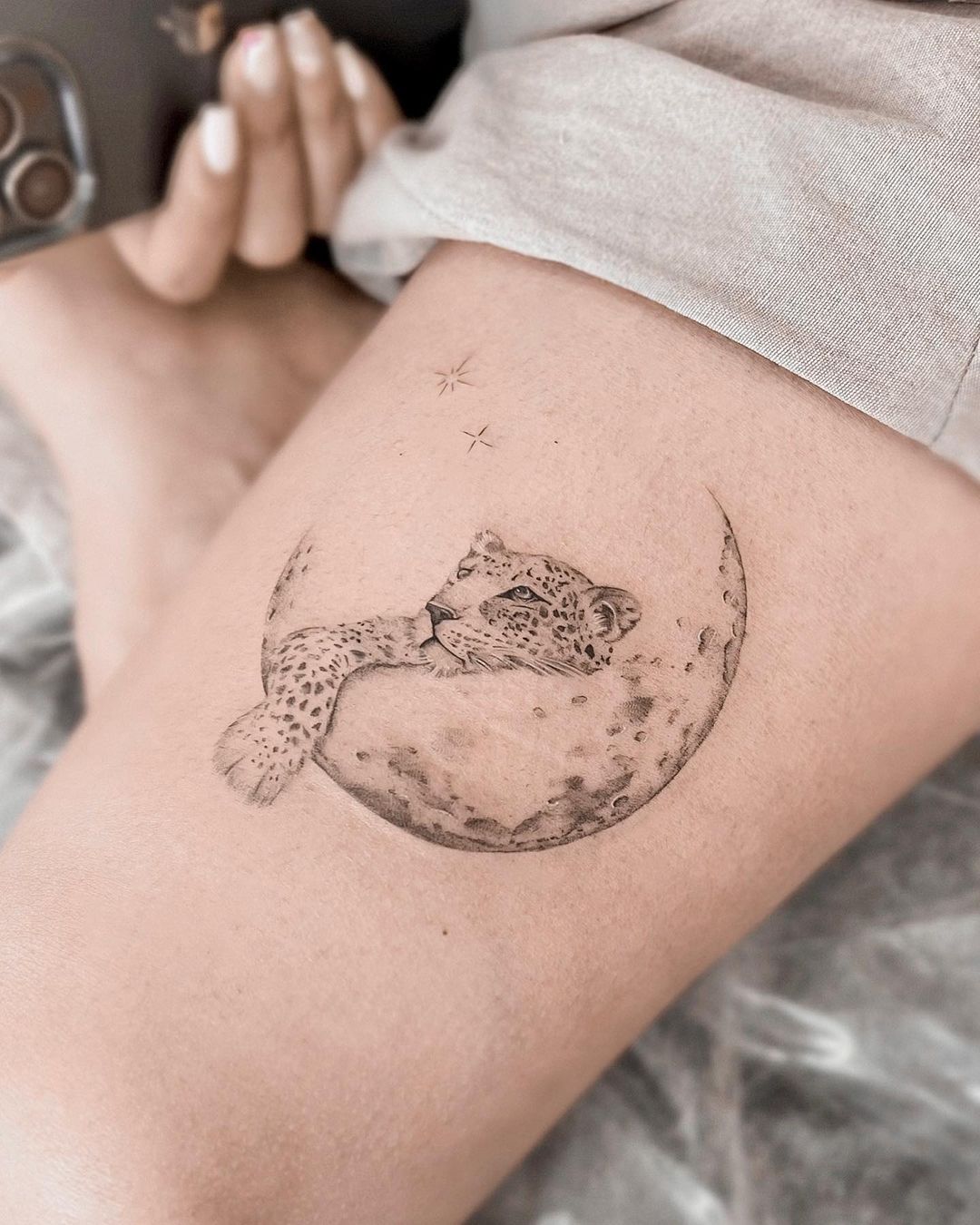 moon with animal tattoo by zeetattooo