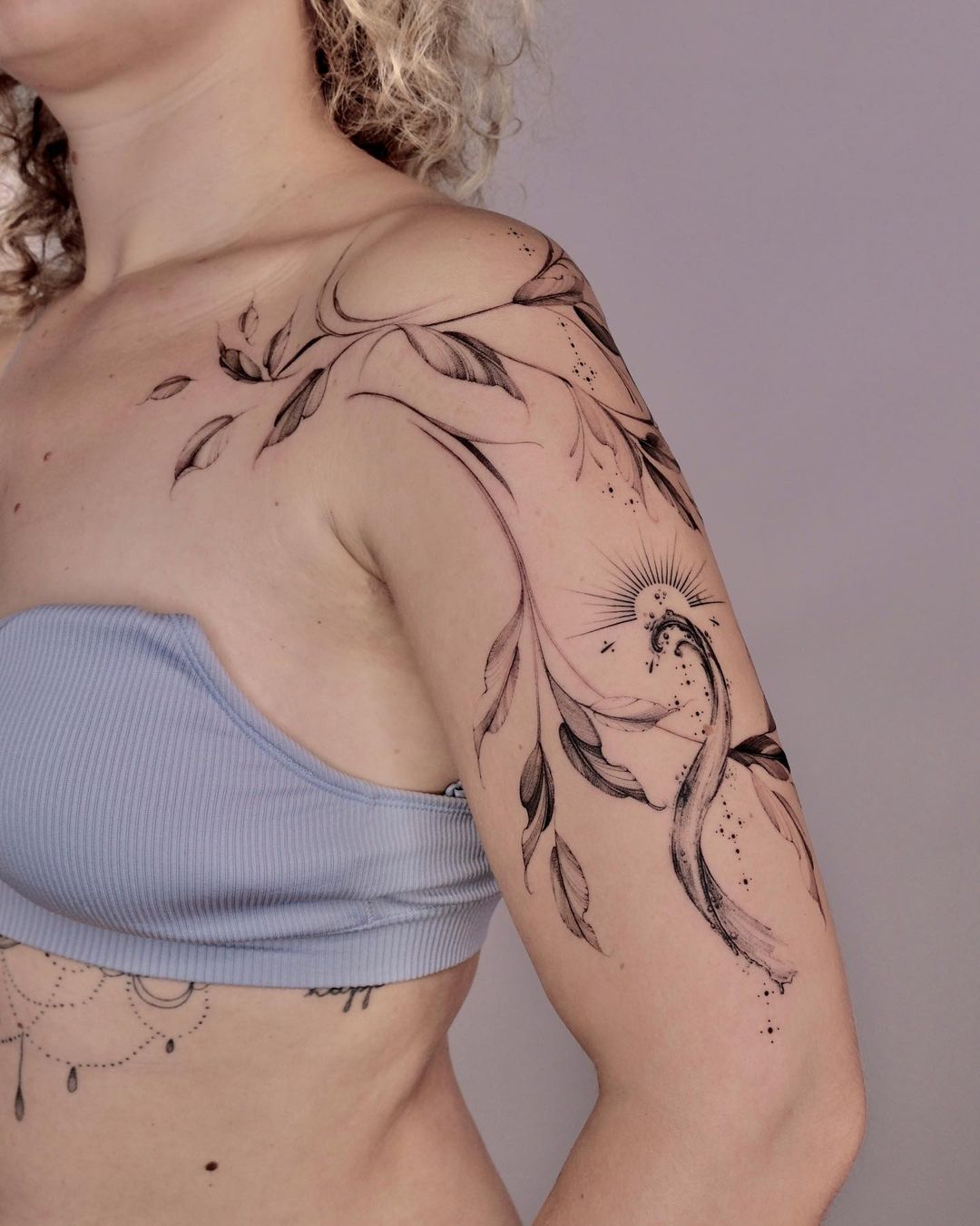 shoulder tattoo design by lasstattoo