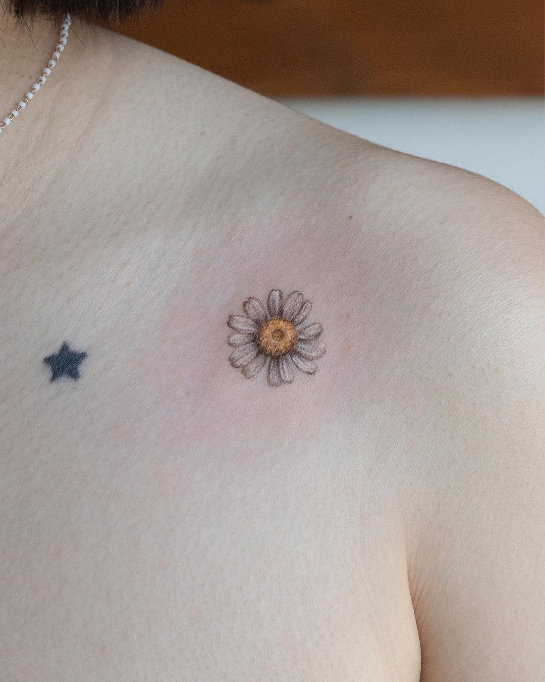 simple flower tattoo by handitrip