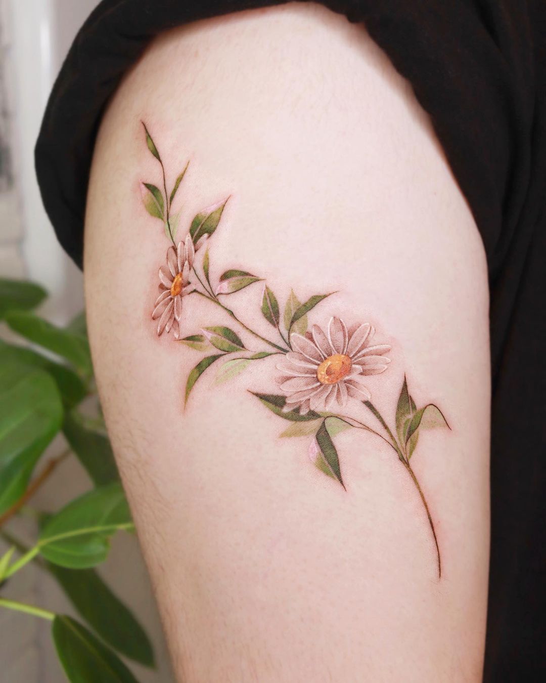 simple flower tattoo by sozil tattoo