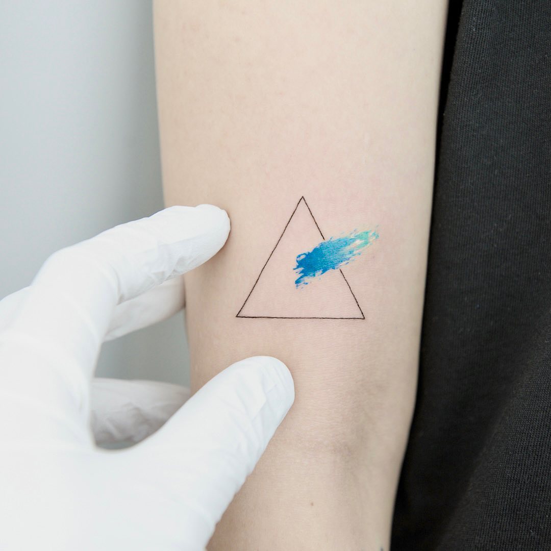 simple triagle tattoo by tattooist green