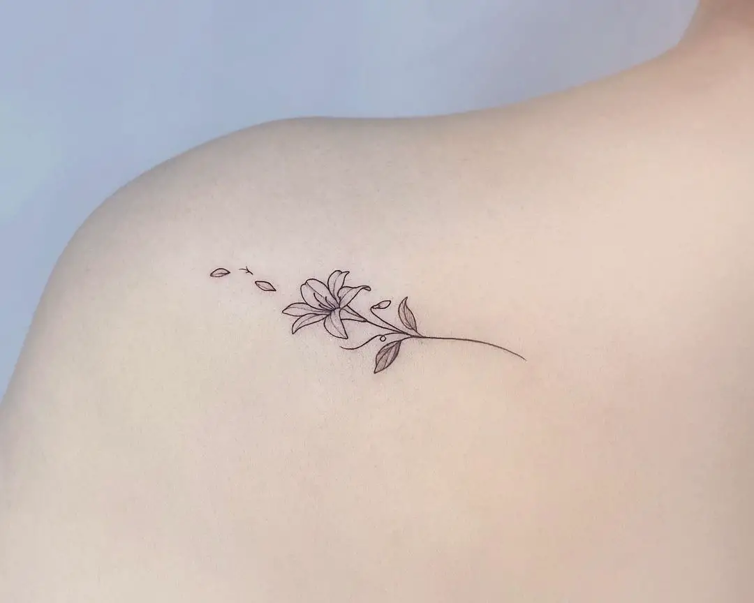 small lily tattoo design by yeowool tattooer 2
