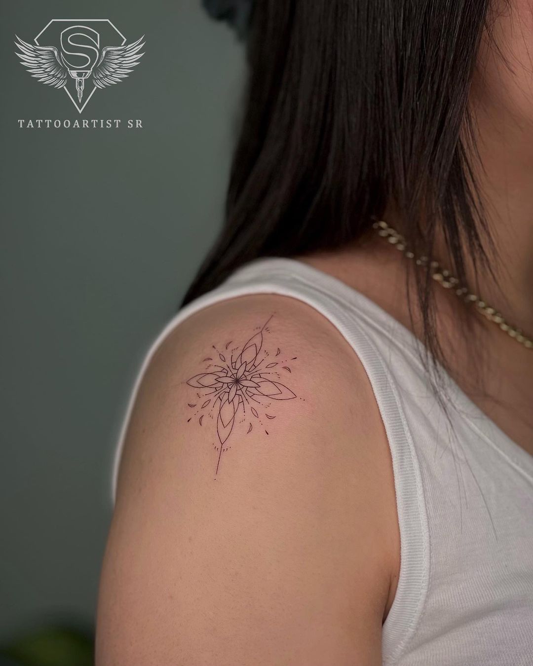 small tattoo on shoulder by tattooartist sr