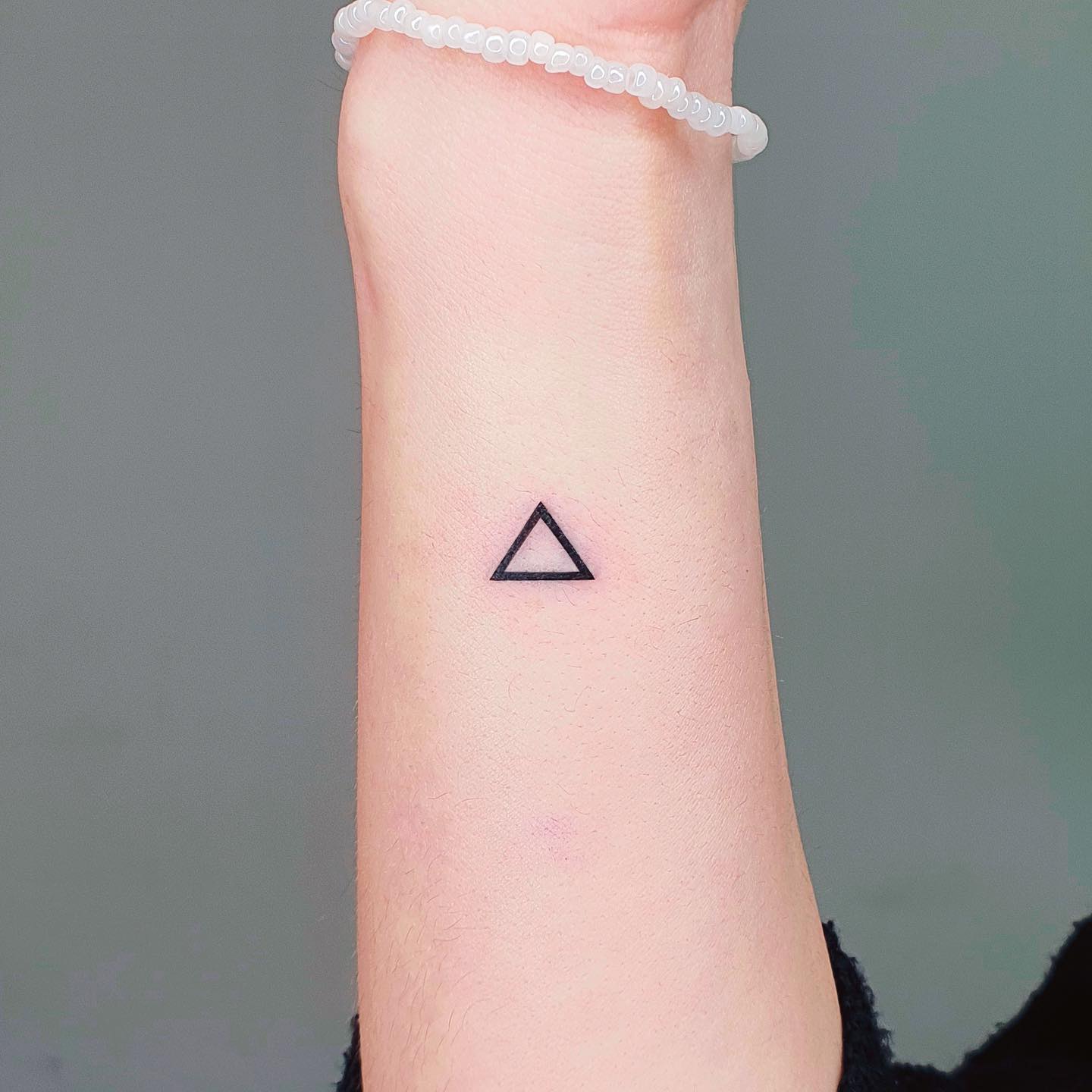 small triangle tattoo ideas by martinatattooer