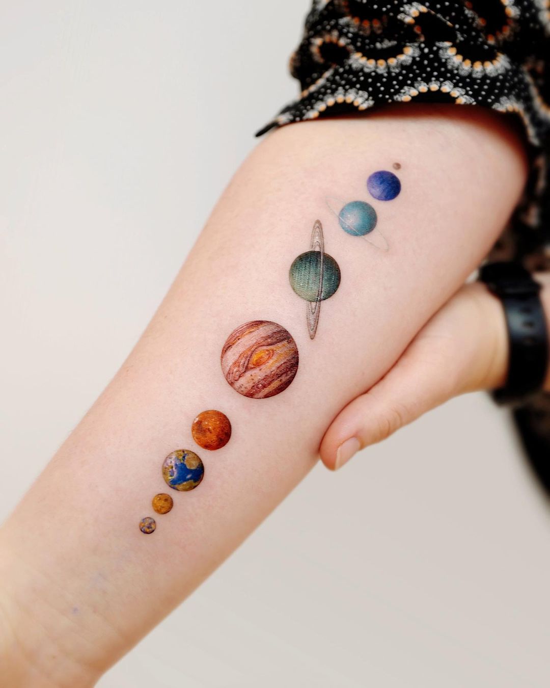 solar system tattoo for men by paw.tattoo