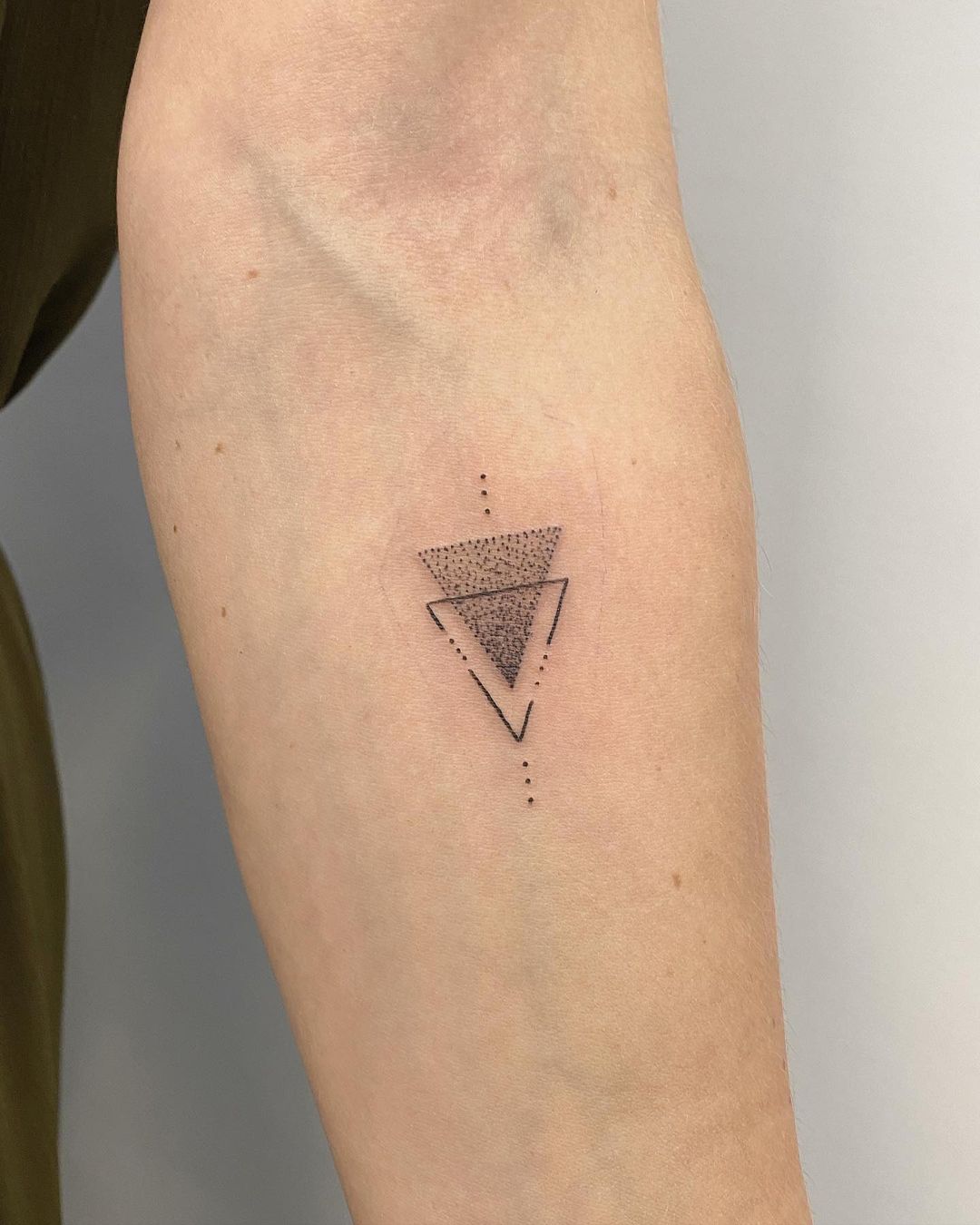 triangle on arm tattoo by kalliolahti.tattoo