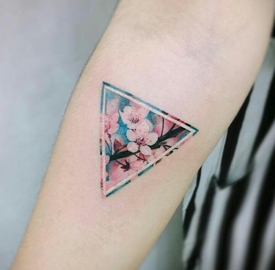 triangular geometric flower tattoo