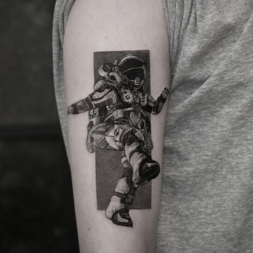 unique astronaut tattoo design by lucyorbarker