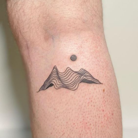 unique mountain and sun tattoo
