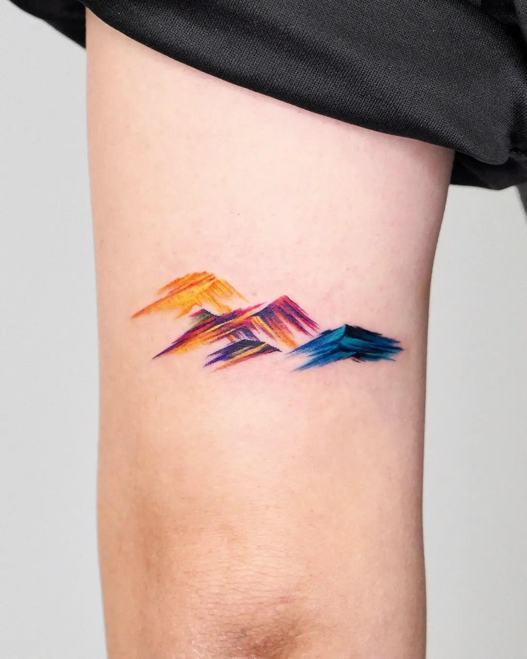watercolor mountain tattoo by tattooist zela
