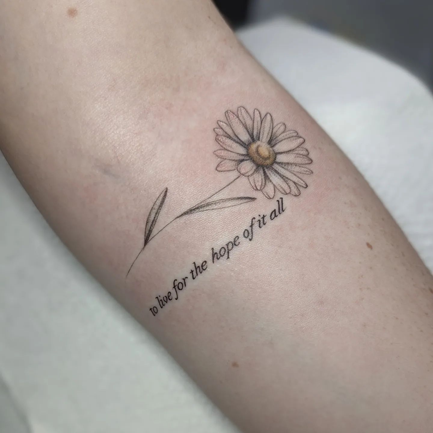 white daisy tattoo by ebonywilliams tattoos