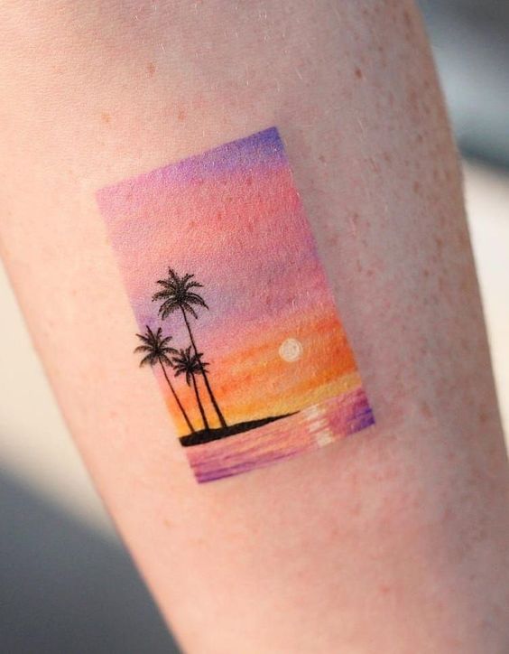 Beach and sun tattoo
