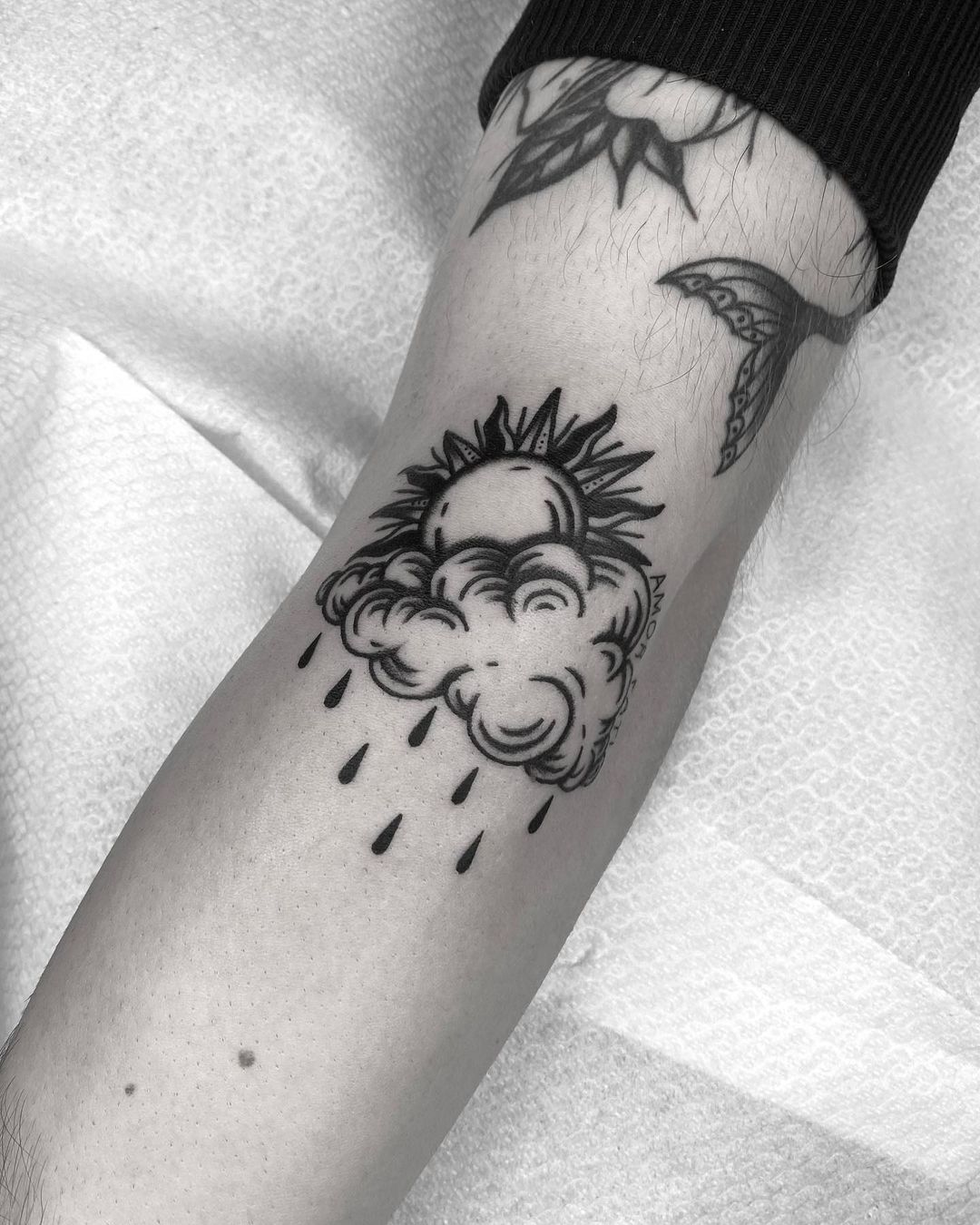 Black and grey inked cloud tattoo design by cosmoink