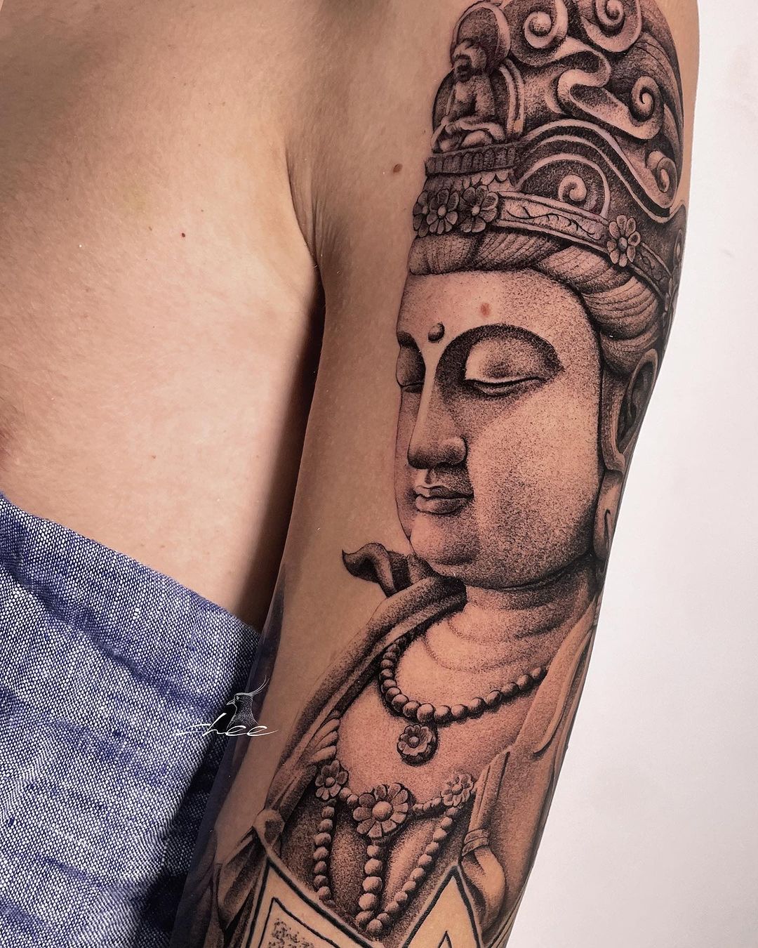 Buddha tattoo for men by chee.tattoo