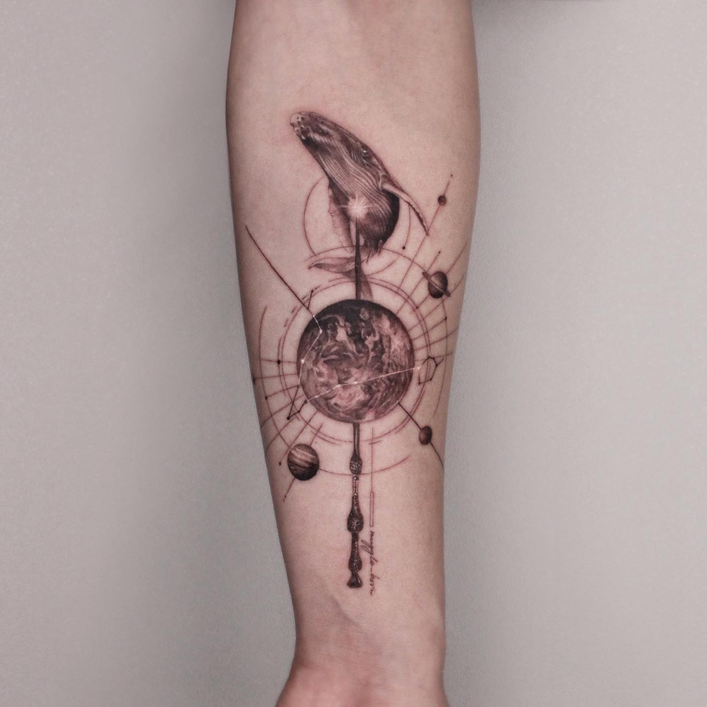 Geometric earth tattoo by tattooist eheon