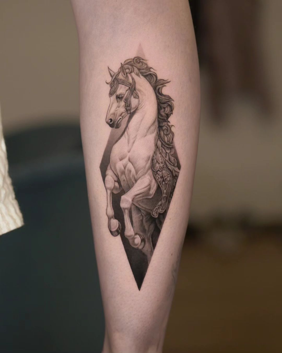 Create an arm sleeve tattoo that combines a cardinal Compass, Arrow,  Mandala, Hummingbird, horse, turtle, melia flower, dolphin, maple leaf, and  four leaf clover tattoo idea | TattoosAI