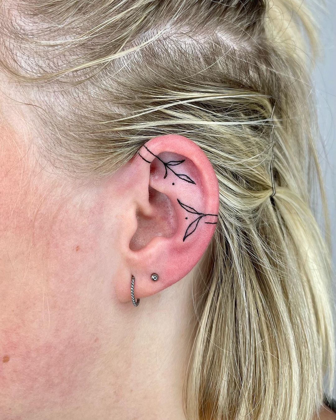 Minimalistic ear tattoo by bloodtypegold
