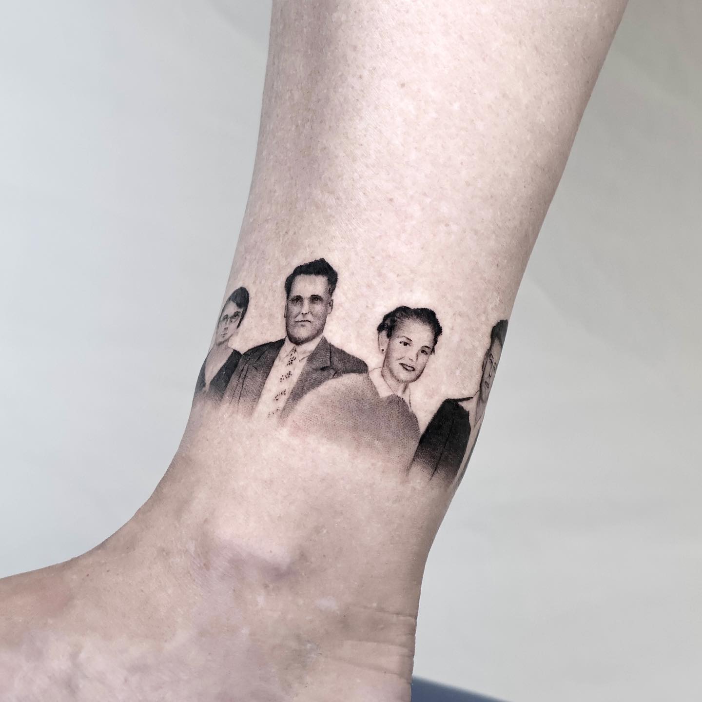 Minimalistic portrait tattoo by indigo tattooer