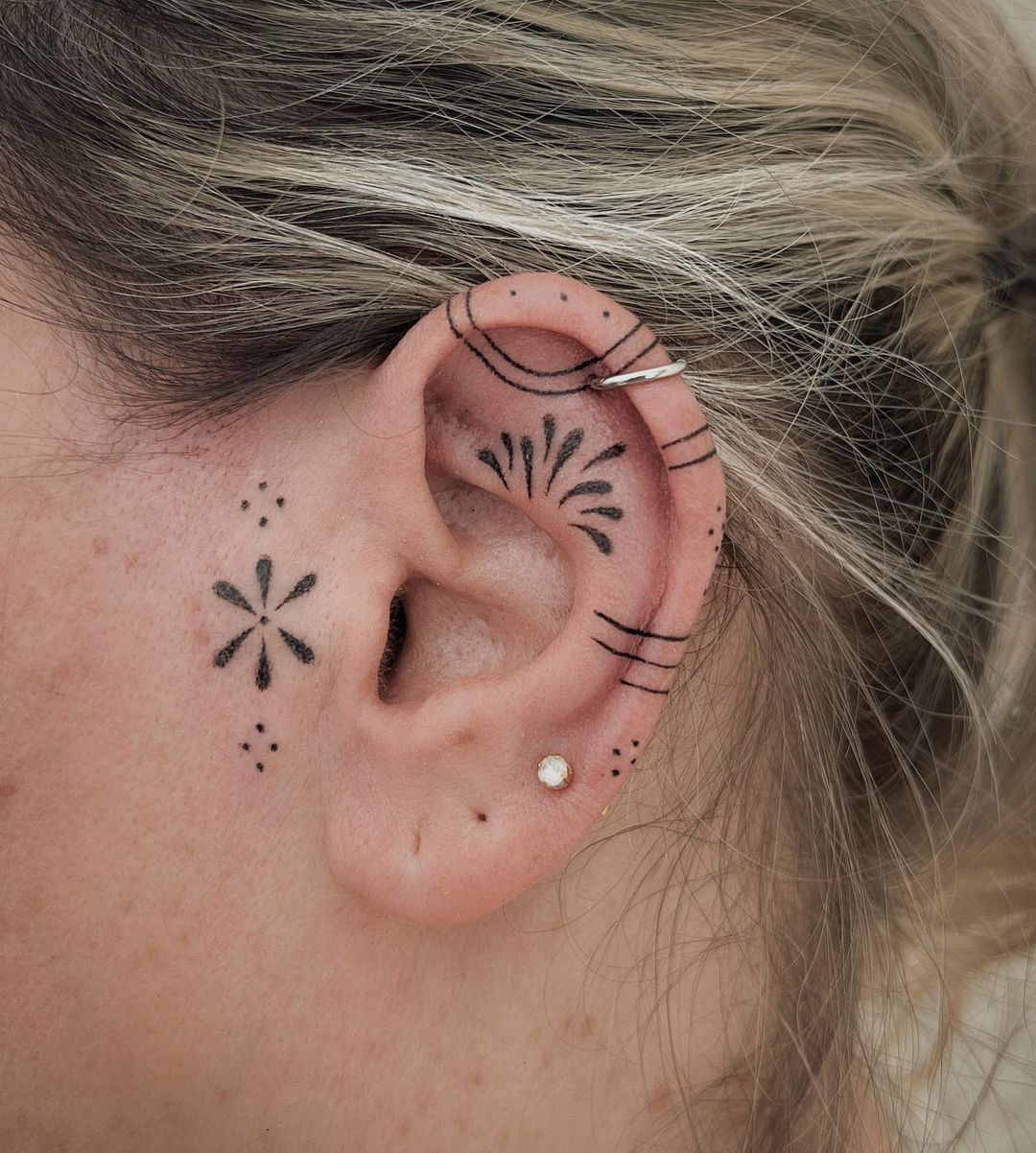 Tattoo on ear by melpzvc