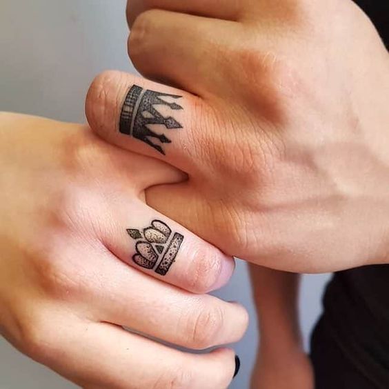 amazing crown finger tattoo