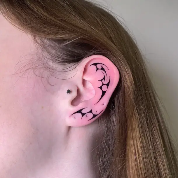 amazing ear tattoo design by fiorile.ttt