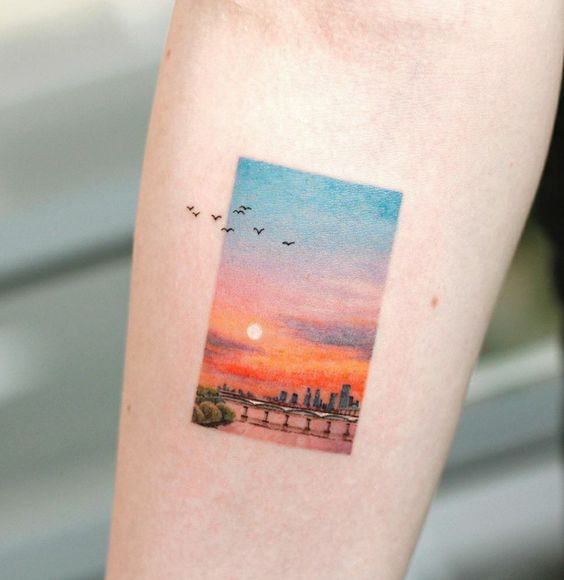 beach and sun tattoo design