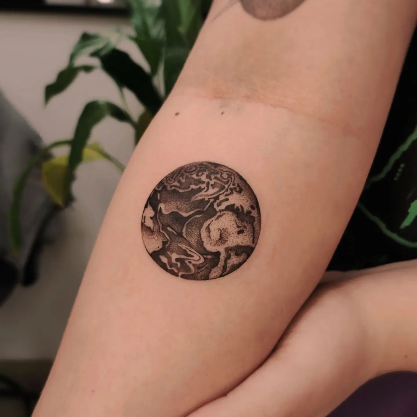 black and white earth tattoo by terra tattoo