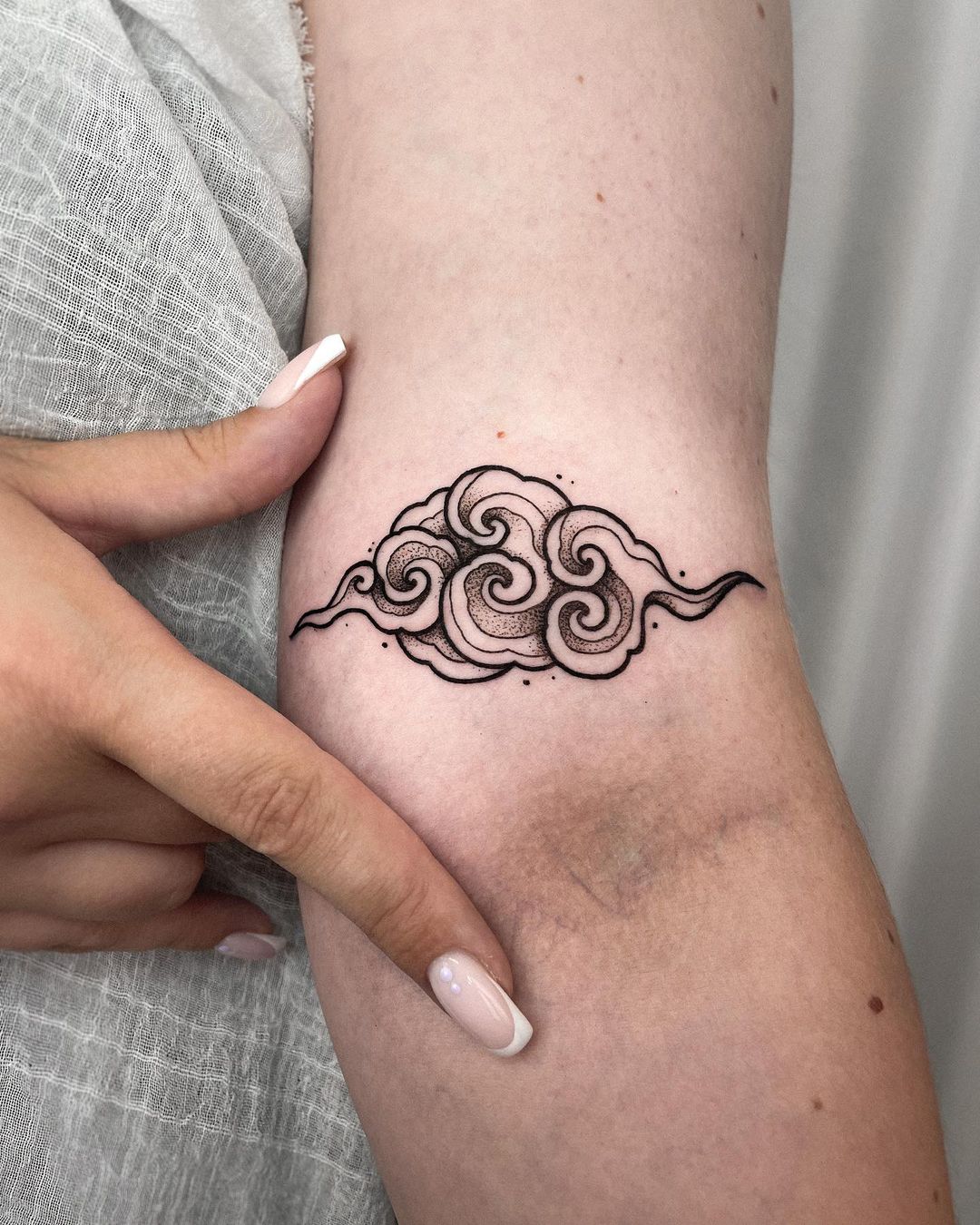 cloud tattoos for women by whiskeyandcreamtattoo