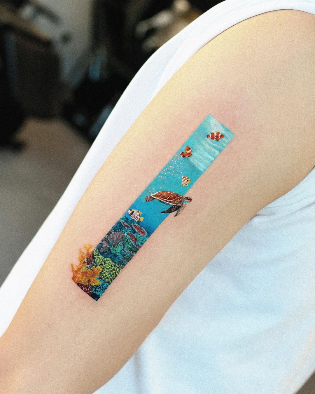 colorful beach tattoo by tattooist mul