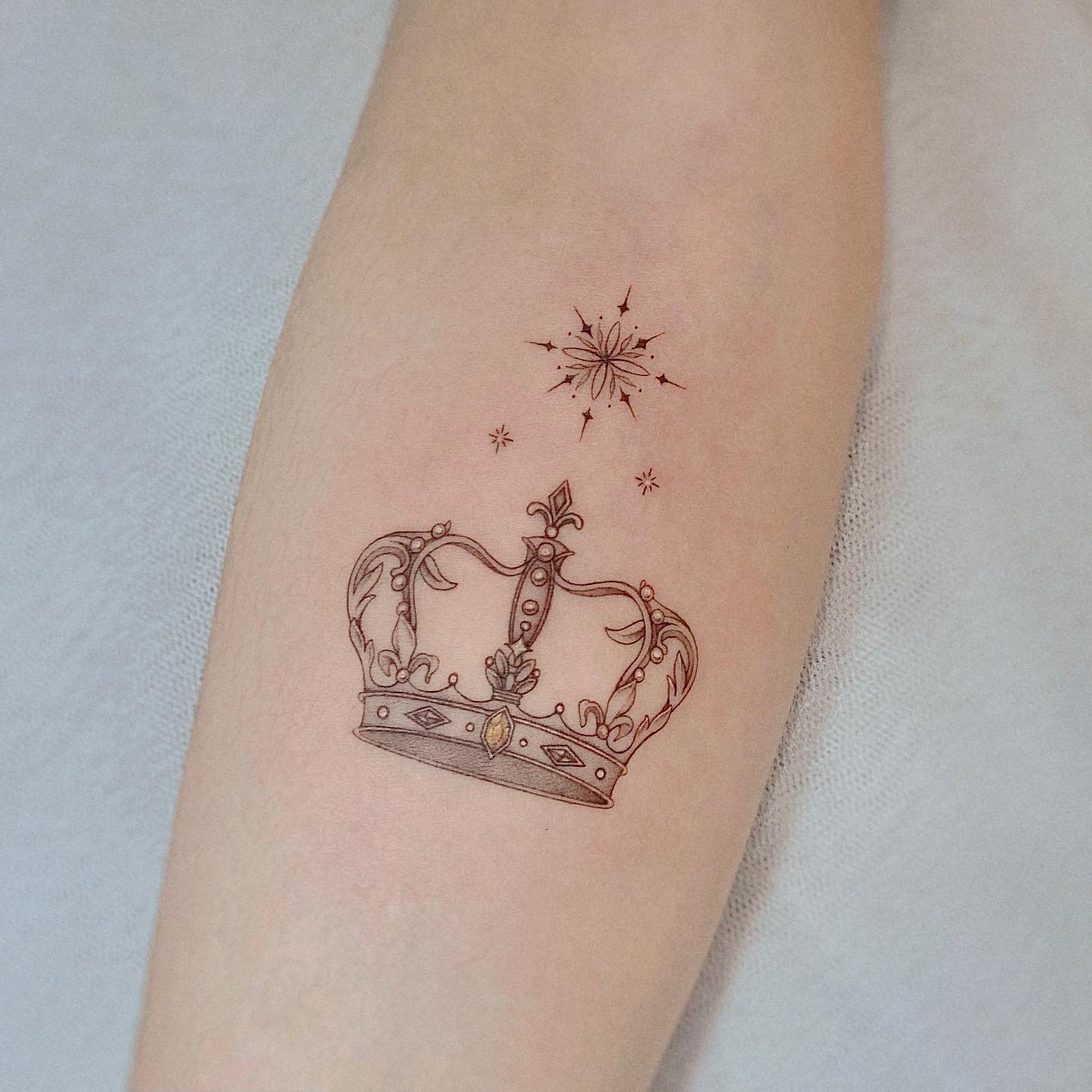 crown tattoos by yeowool tattooer