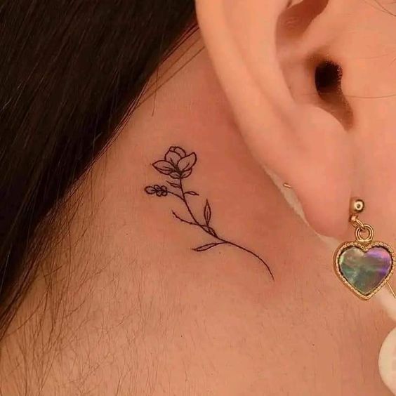 cute rose behind ear