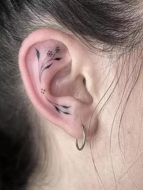 flower ear tattoo