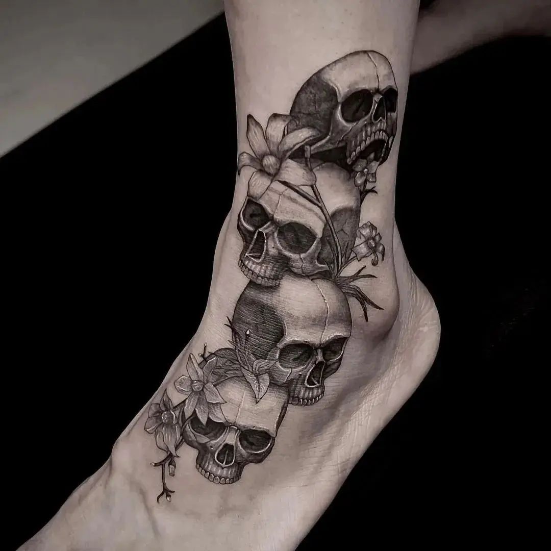 skull and flower tattoo by skullcrazy.vn