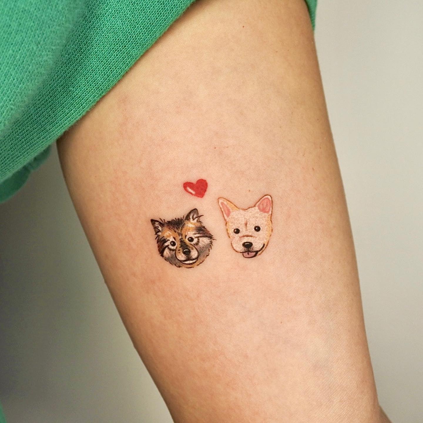 small dog tattoo by seon tattoo