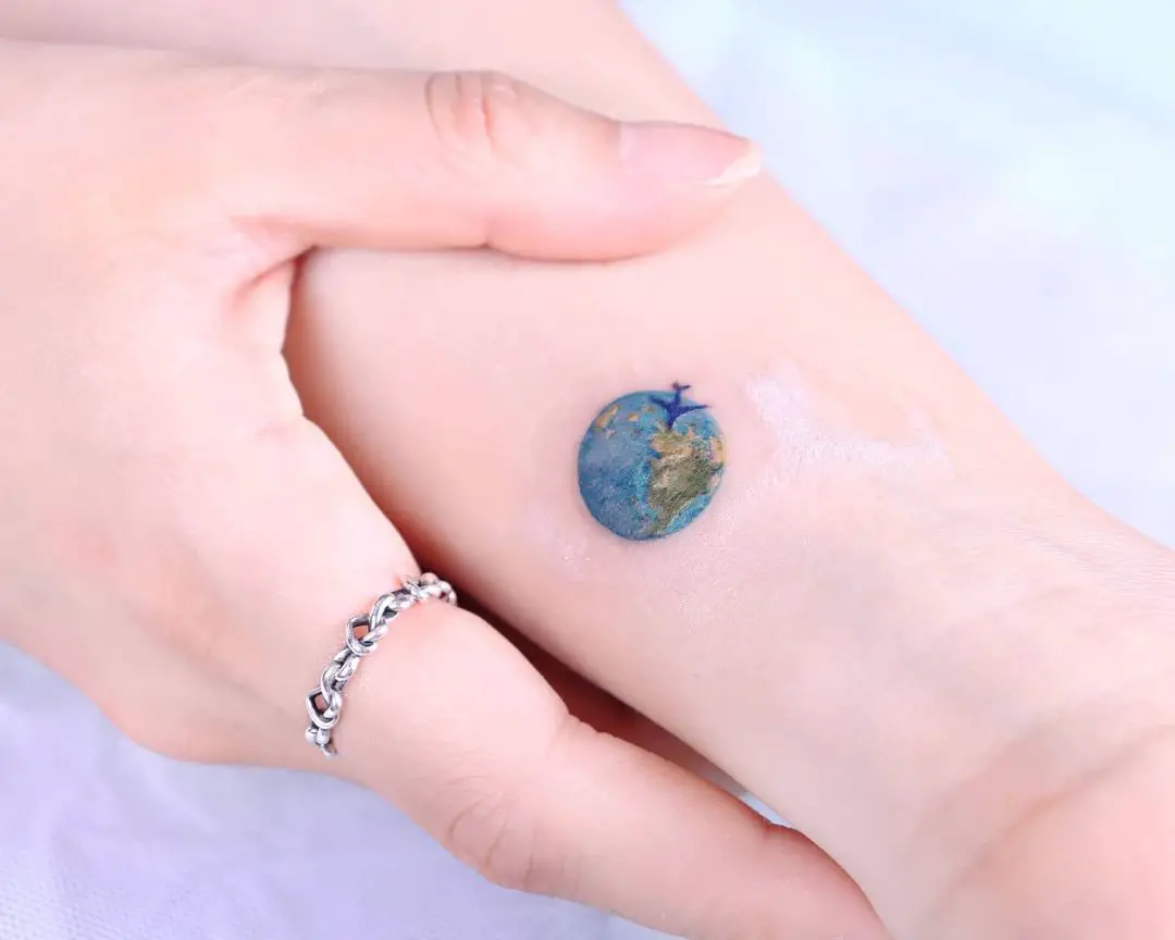 small earth tattoos by peria tattoos