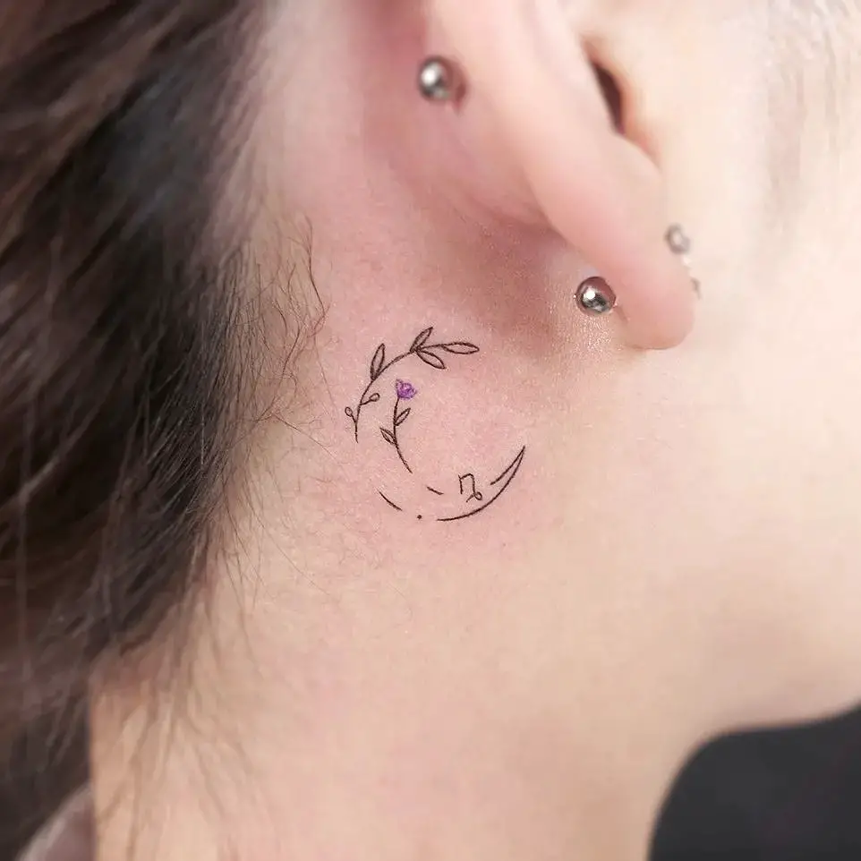 tiny ear tattoo by gorae tattoo