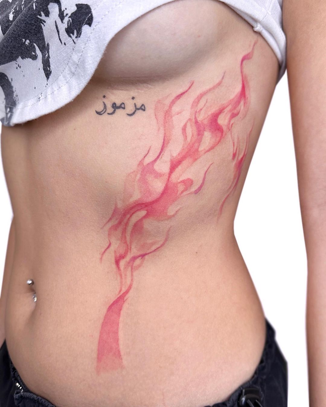 Abstract watercolor tattoo by uzotattoo