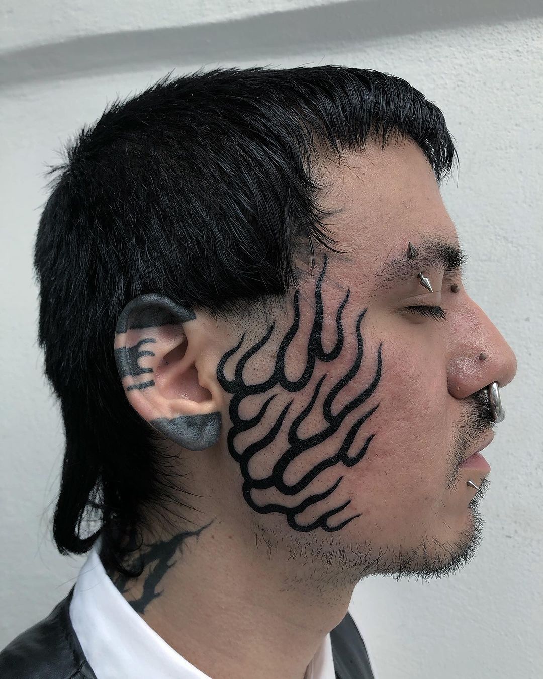 Amazing face tattoo by entelequiagrafica