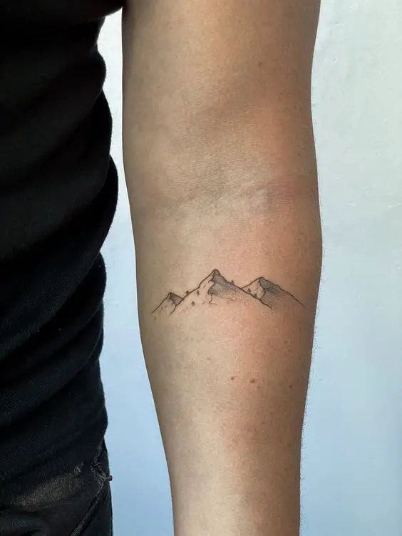 Amazing mountain tattoo design
